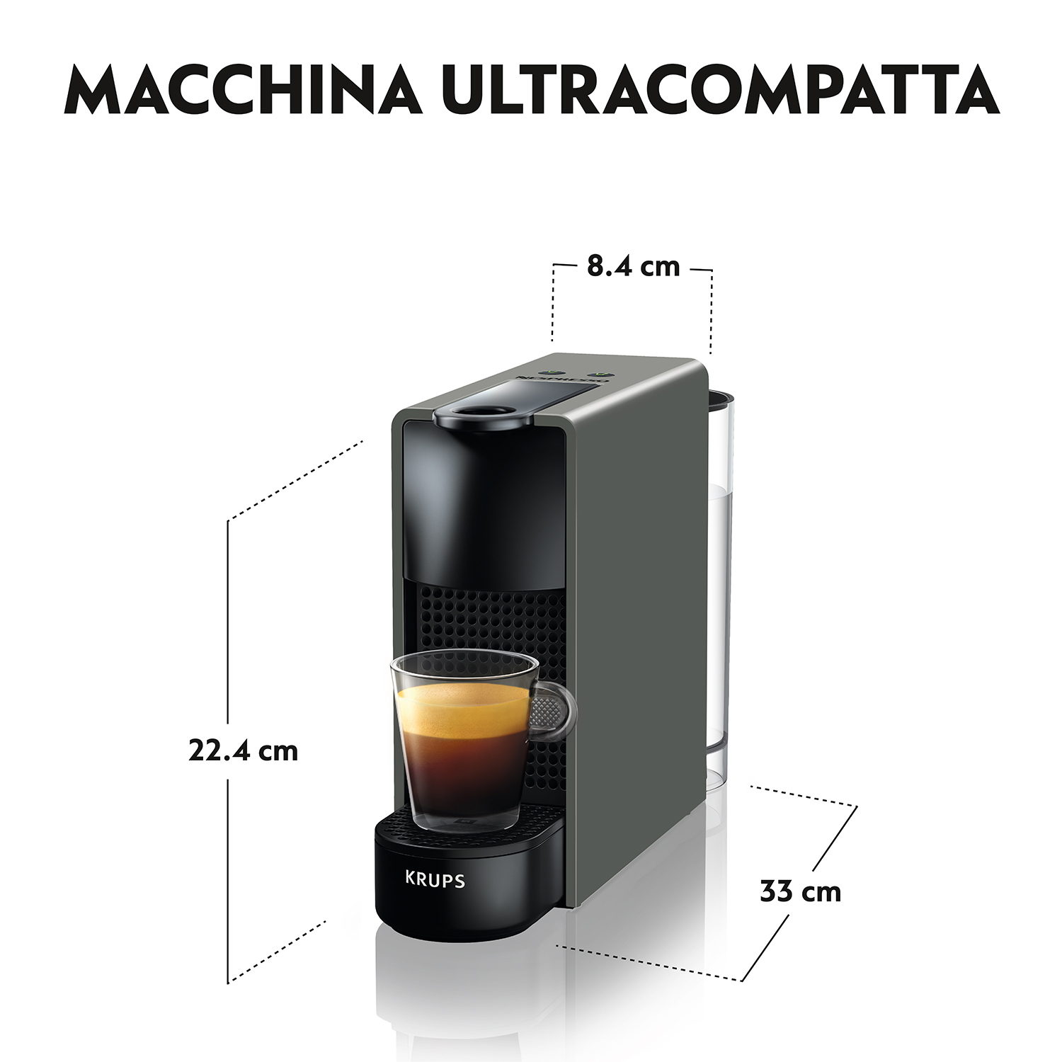 Macchina per espresso grigia con una tazza di vetro su sfondo bianco.