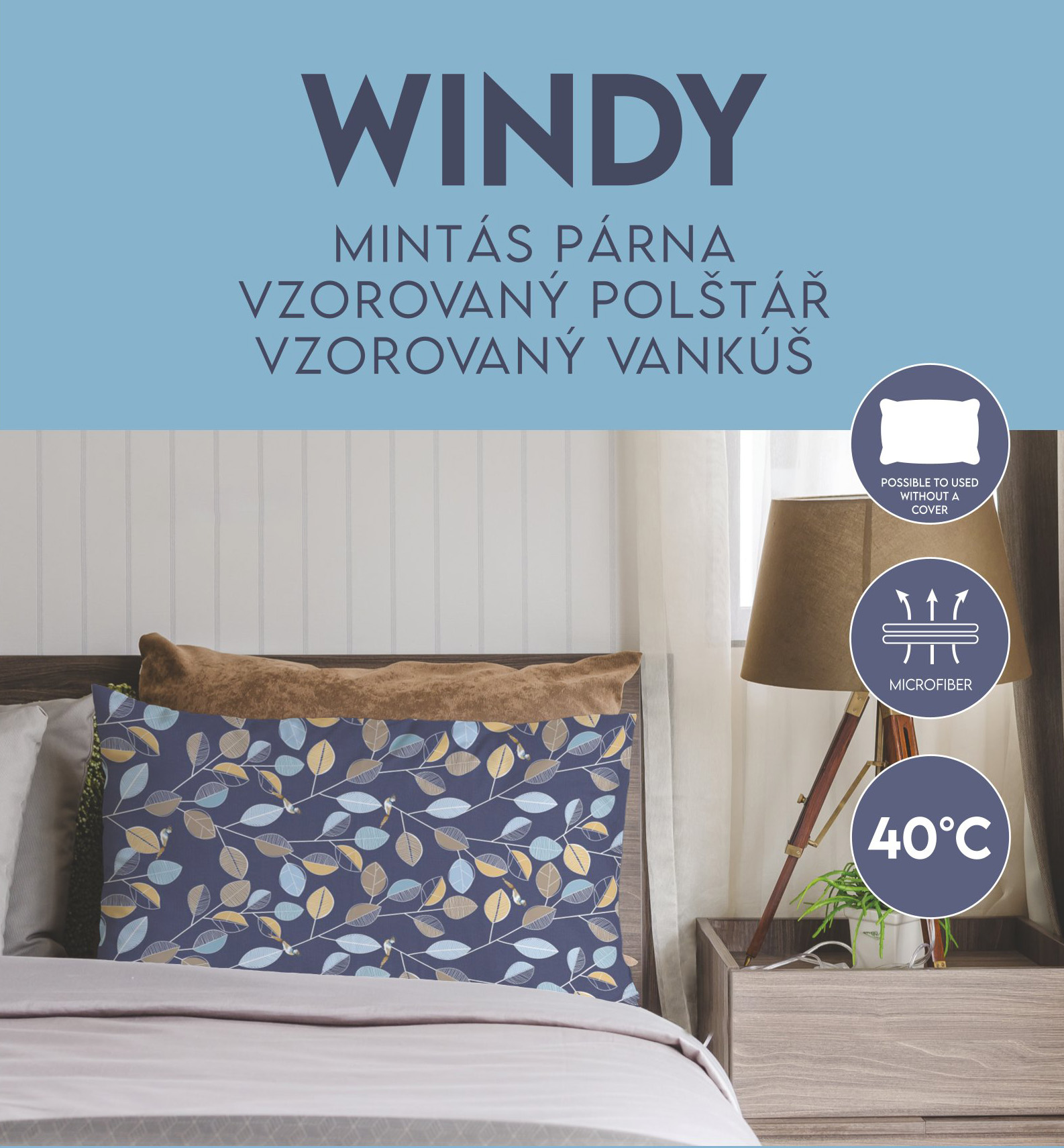 Párna levélmintával, az ágyon. 'WINDY' felirat és egyéb termék részletek.