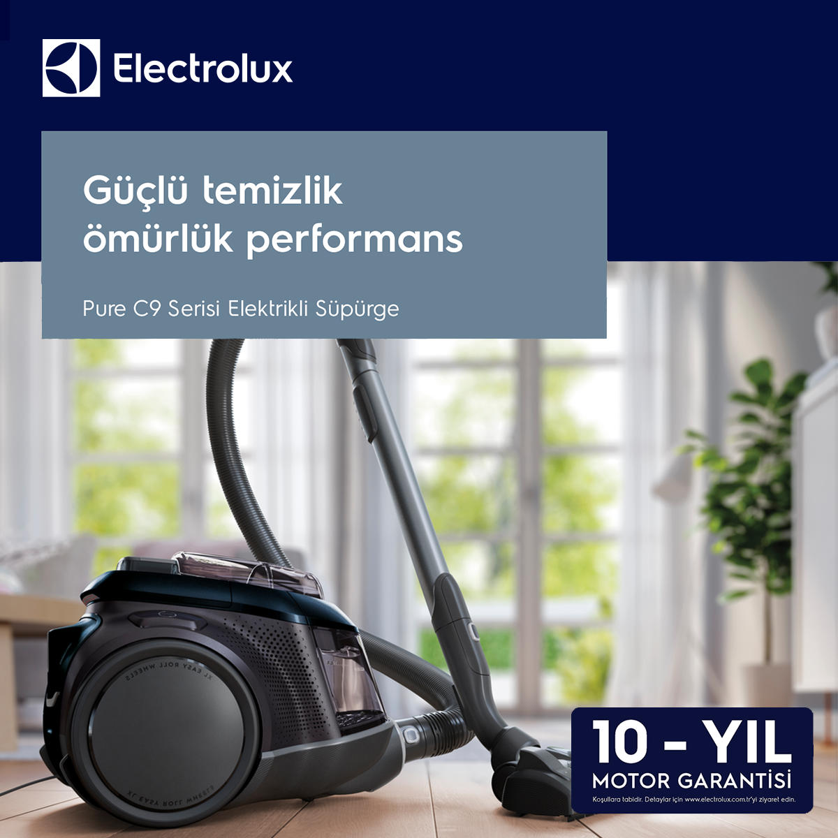 Siyah hortumlu ve '10-YIL MOTOR GARANTİSİ' metinli siyah bir Electrolux elektrikli süpürge.