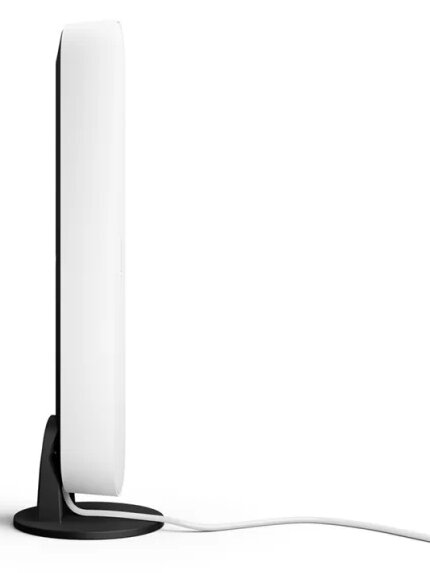 Białe i czarne prostokątne urządzenie stojące na czarnym stojaku. Podłączony jest biały kabel.