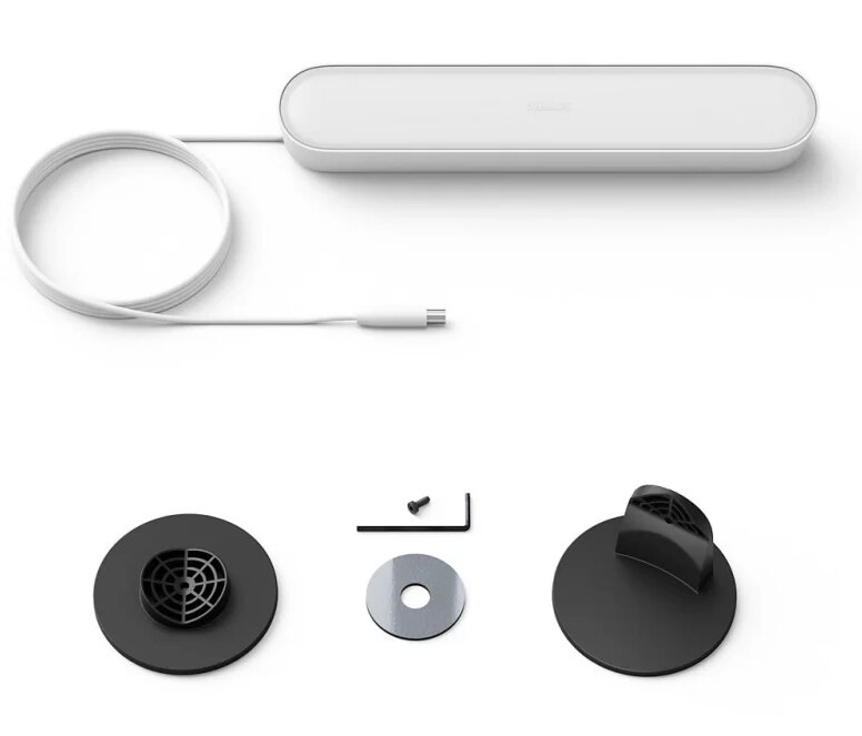 Biały pasek świetlny Philips Hue z białym kablem i akcesoriami montażowymi: dwa czarne stojaki, śruba i podkładka.