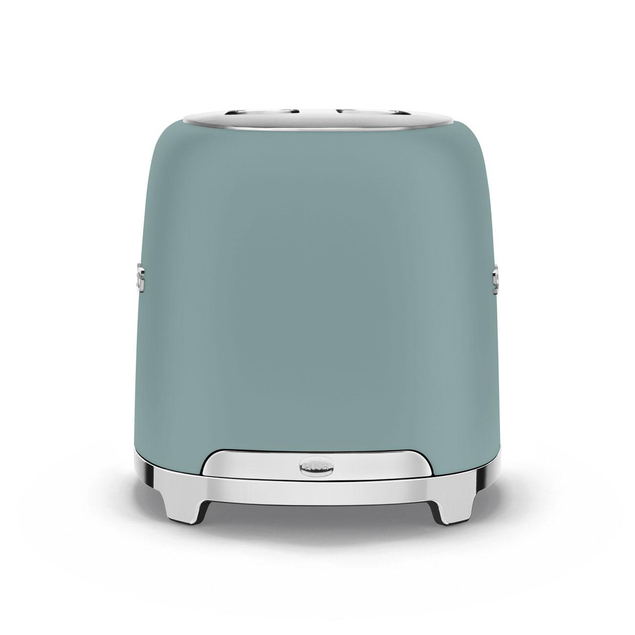 Ein teal-farbener Toaster mit Chromakzenten. Er hat einen Schlitz für Brot und einen Knopf am Sockel.