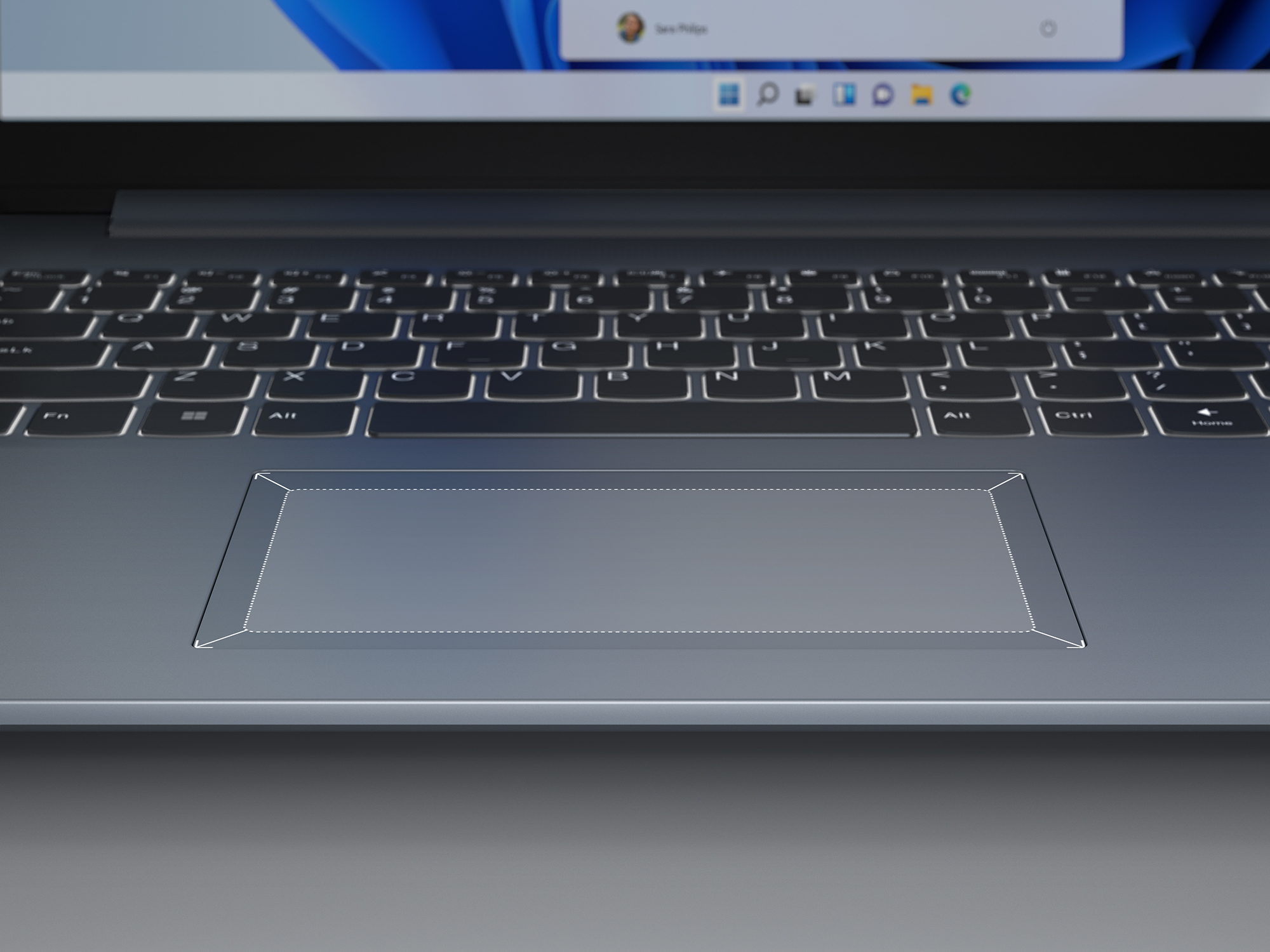 Laptop-Touchpad mit gepunkteter Umrandung für den Touch-Bereich.