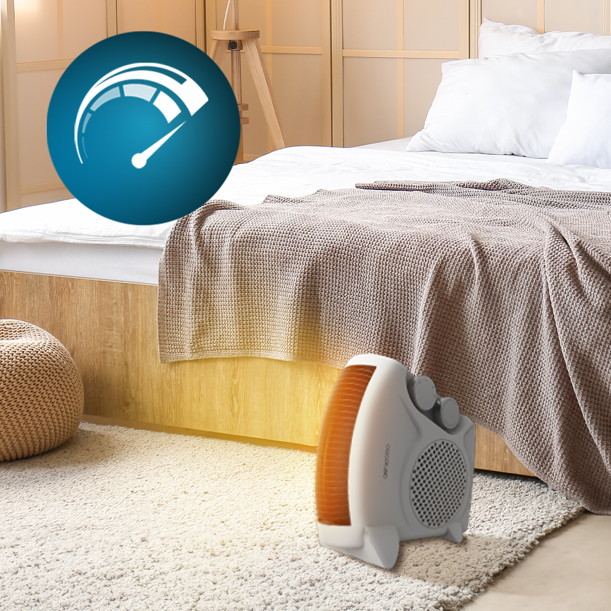 Calentador blanco y naranja en una alfombra cerca de la cama con indicador azul.