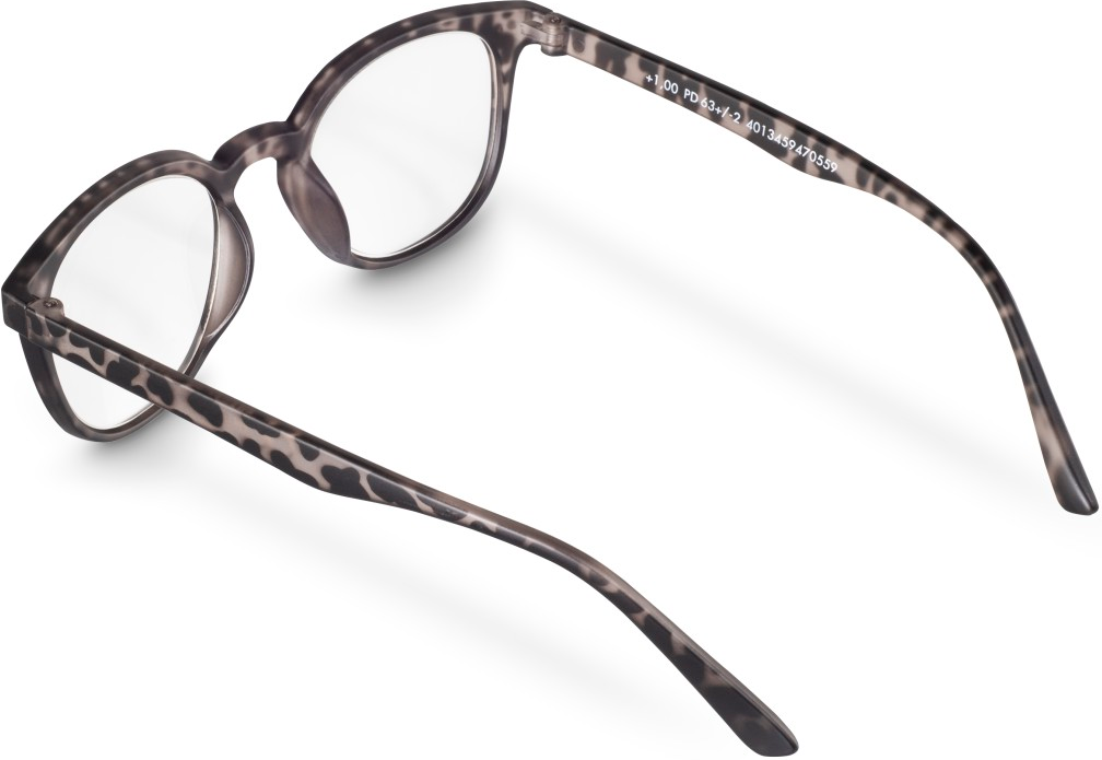 Lunettes avec monture imprimée léopard, verres clairs, fond blanc.