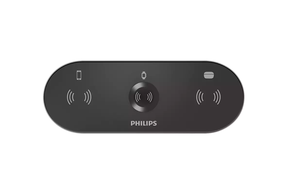 Siyah bir arka plan üzerinde telefon, saat ve sinyal simgeleri olan siyah bir Philips uzaktan kumandası.