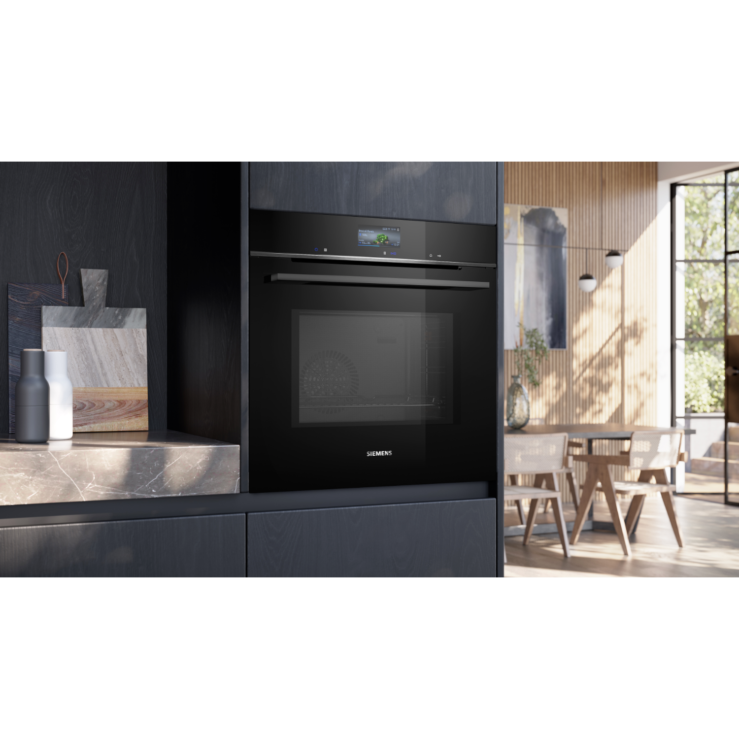 Black oven built into dark cabinetry. A wooden background is visible through the glass. SIEMENS is written on it.