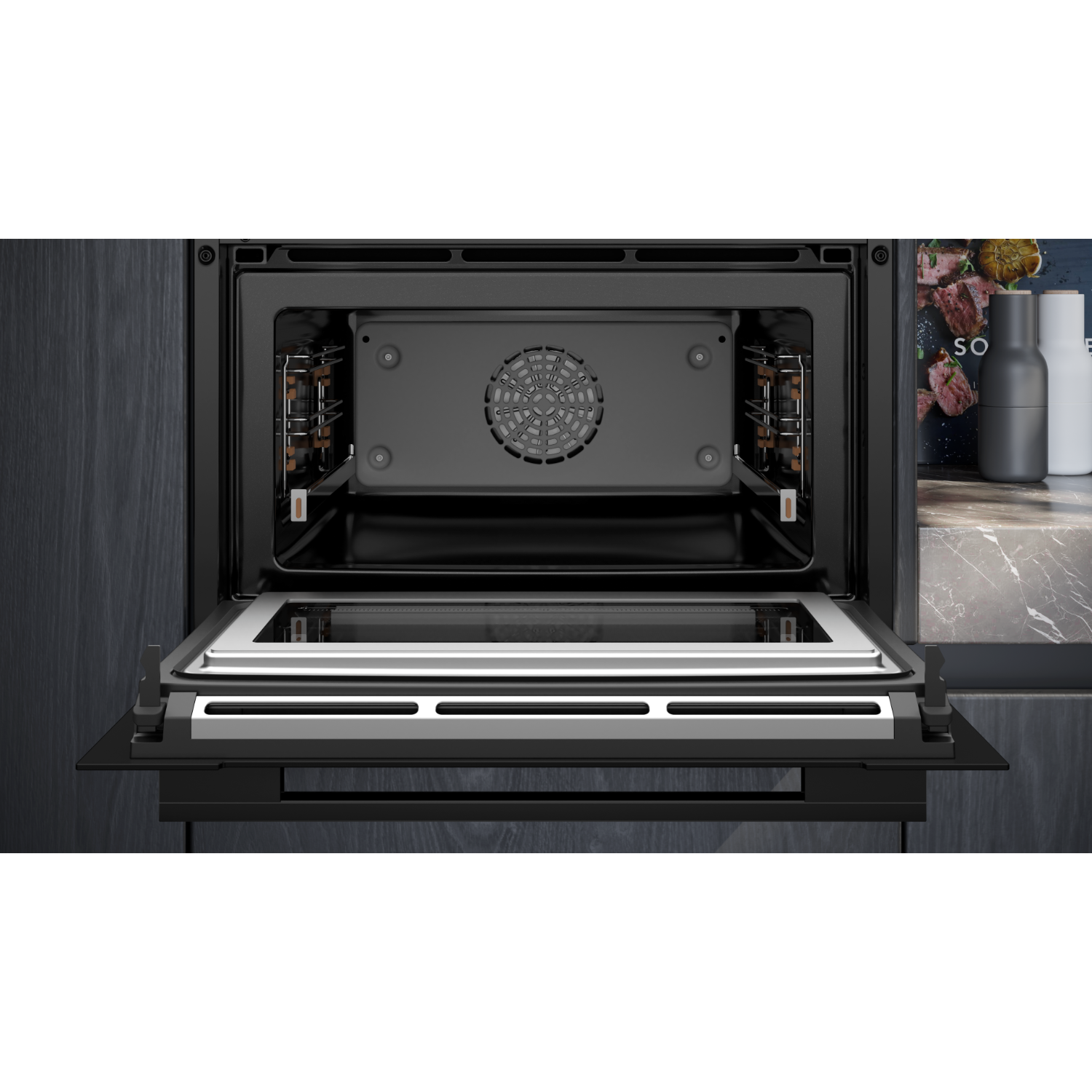 An open oven with the door ajar, revealing the interior with fan and racks.