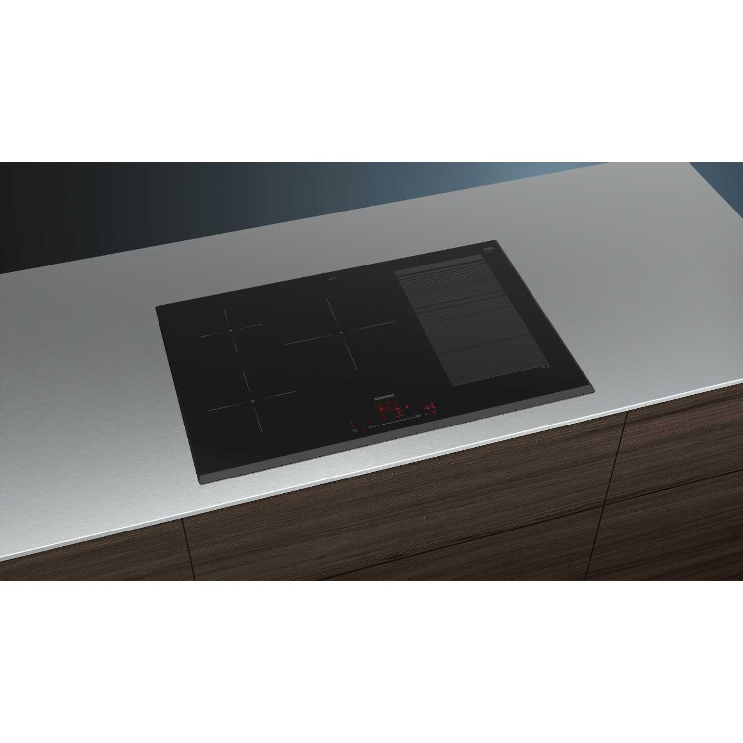 Black induction hob on a countertop, with red display.