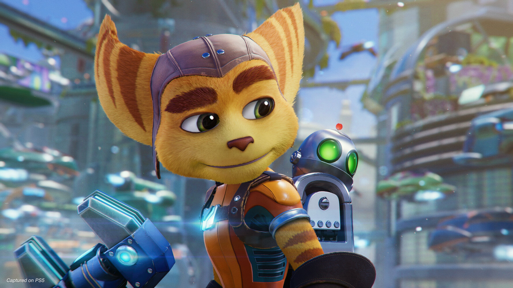 Ratchet i Clank, futrzana postać i robot, patrzą w kamerę.