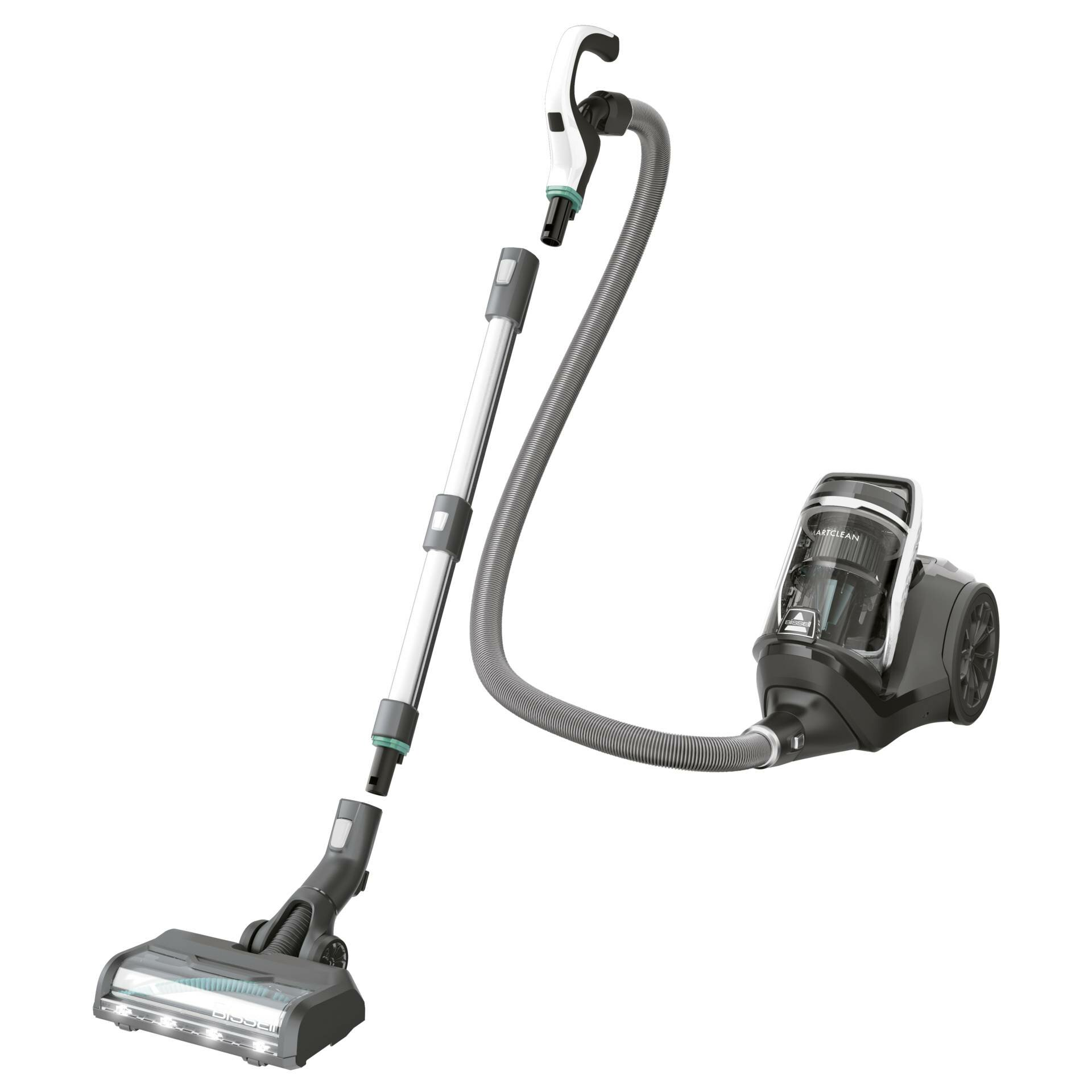 Odkurzacz z szarym wężem i głowicą oraz czarnym pojemnikiem. Białe tło.