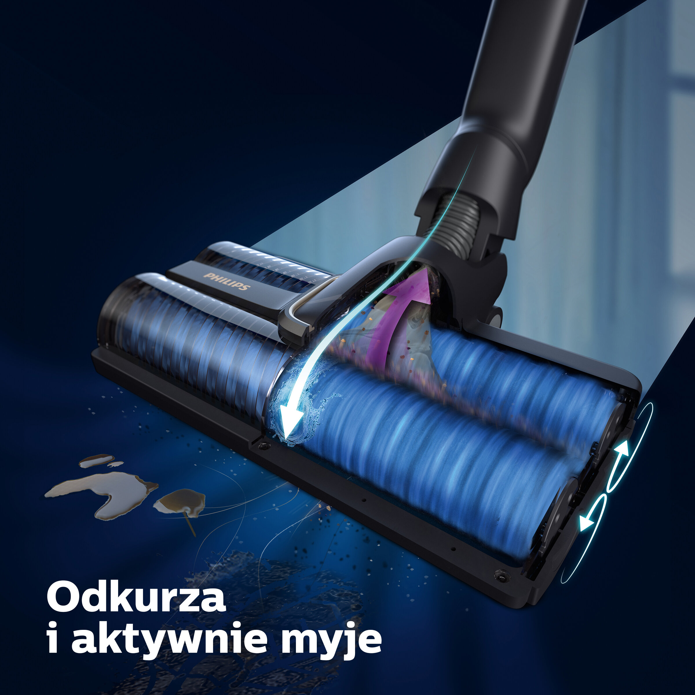 Zbliżenie głowicy odkurzacza czyszczącej powierzchnię. Niebieskie wałki i tekst, który mówi: 'Odkurza i aktywnie myje'.