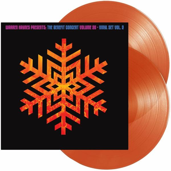 Zwei orangefarbene Schallplatten. Albumcover mit orangefarbenem Schneeflocken-Design.