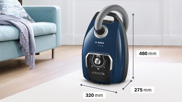 Blauer Staubsauger mit Abmessungen. Abmessungen in mm: 480 Höhe, 320 Länge, und 275 Breite.
