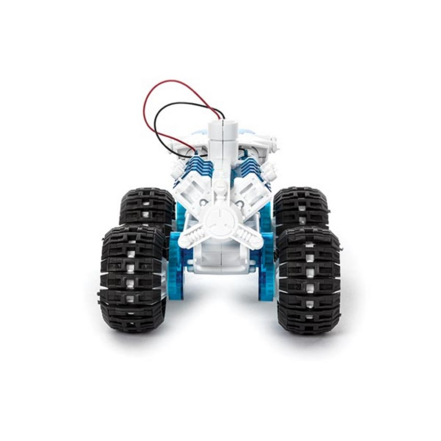 A toy car with four large wheels, white body and blue accents.