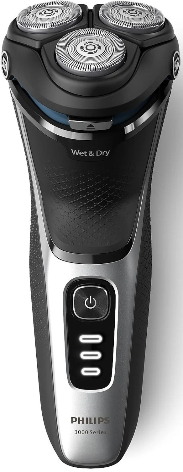 A black and silver electric shaver with three rotating heads. The brand is Philips.
