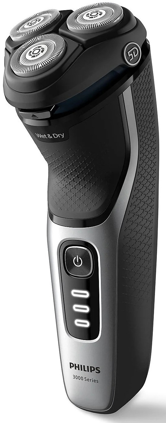 Philips electric shaver. Black and silver design. 3 rotating heads, wet & dry. Power button visible.