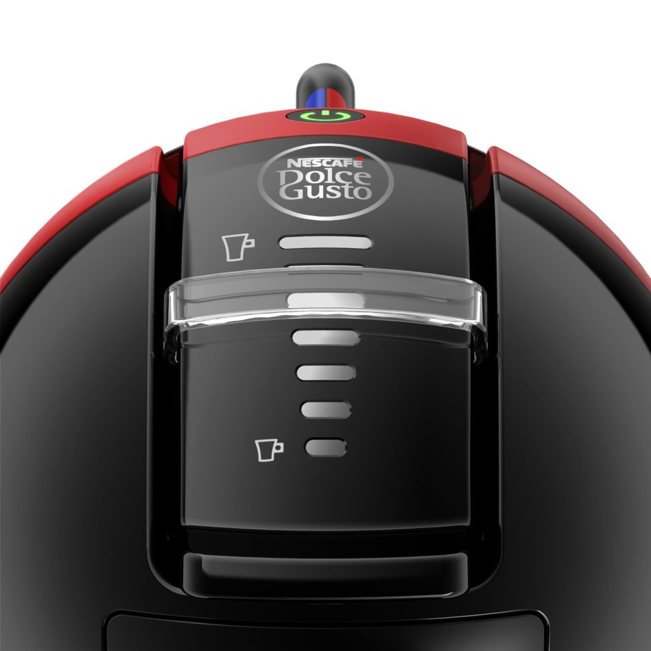 Egy fekete-piros Nescafé Dolce Gusto kávéfőző közelképe. A teteje piros.