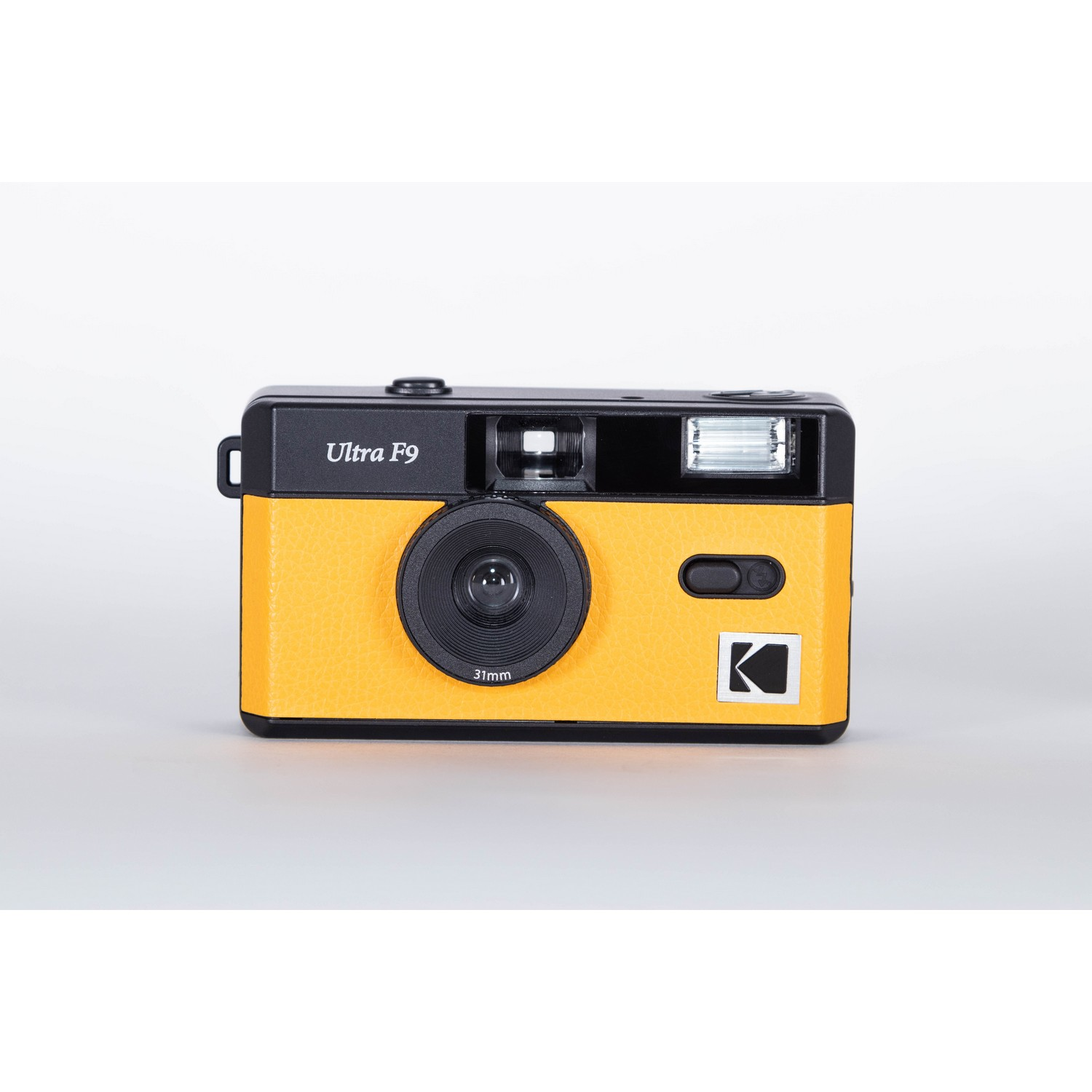 Yellow Kodak Ultra F9 camera on a white background.
