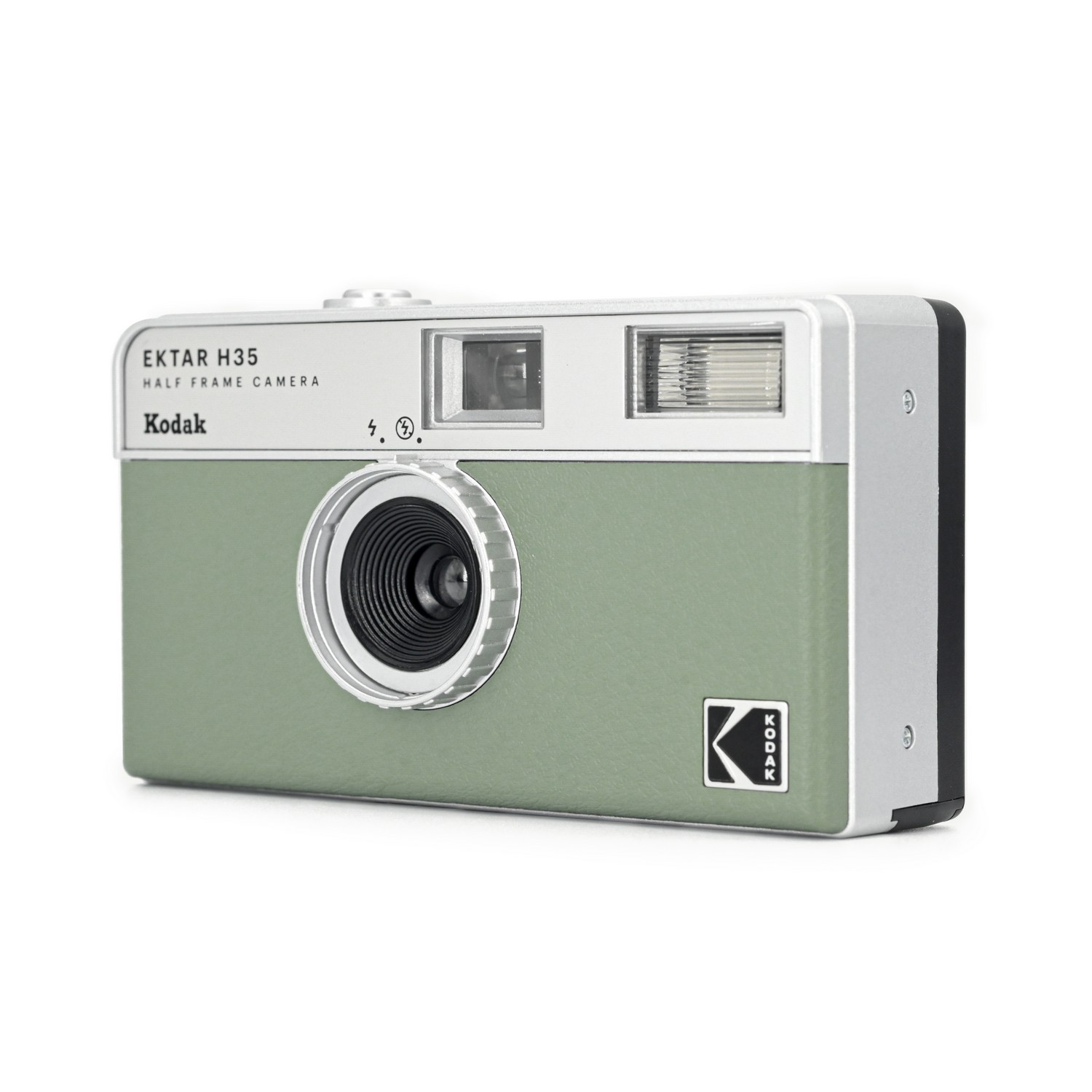 Green and silver retro camera on a white background. The lens is centered.