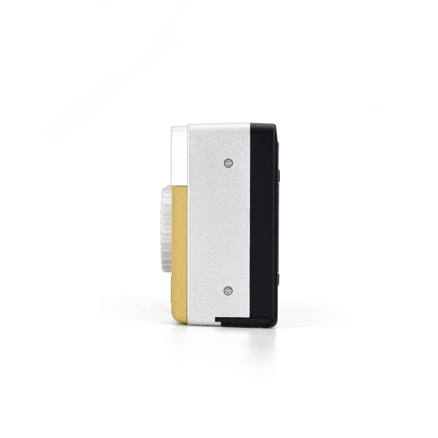 Side view of a compact camera with a silver and gold body, white background.