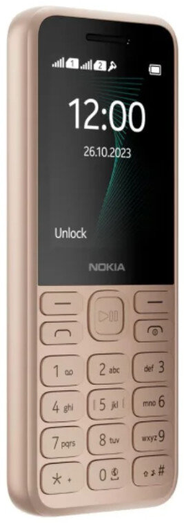 Złoty telefon Nokia. Ekran wyświetla godzinę i datę. Ma klawiaturę na dole.