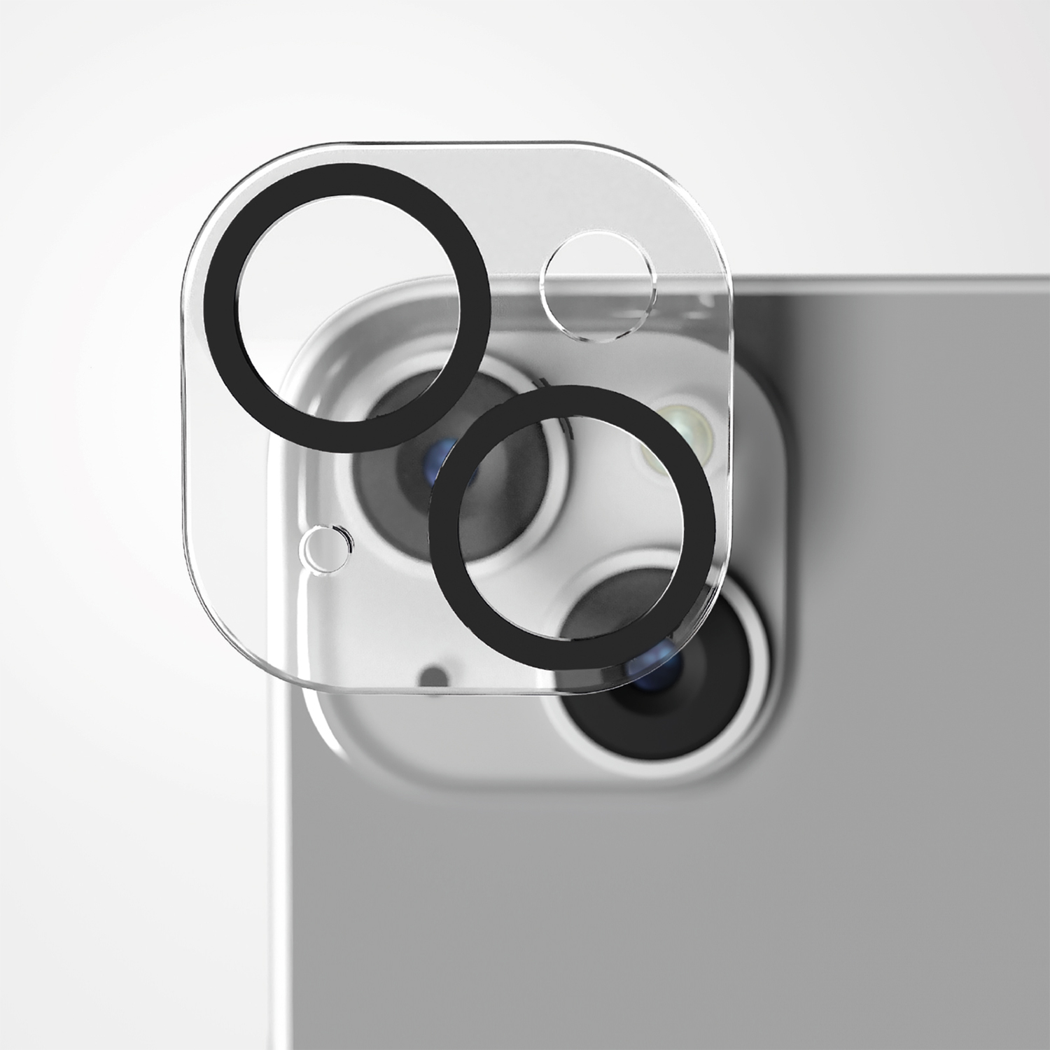 Protezione trasparente dell'obiettivo sopra gli obiettivi della fotocamera del telefono. Sono visibili tre cerchi neri.