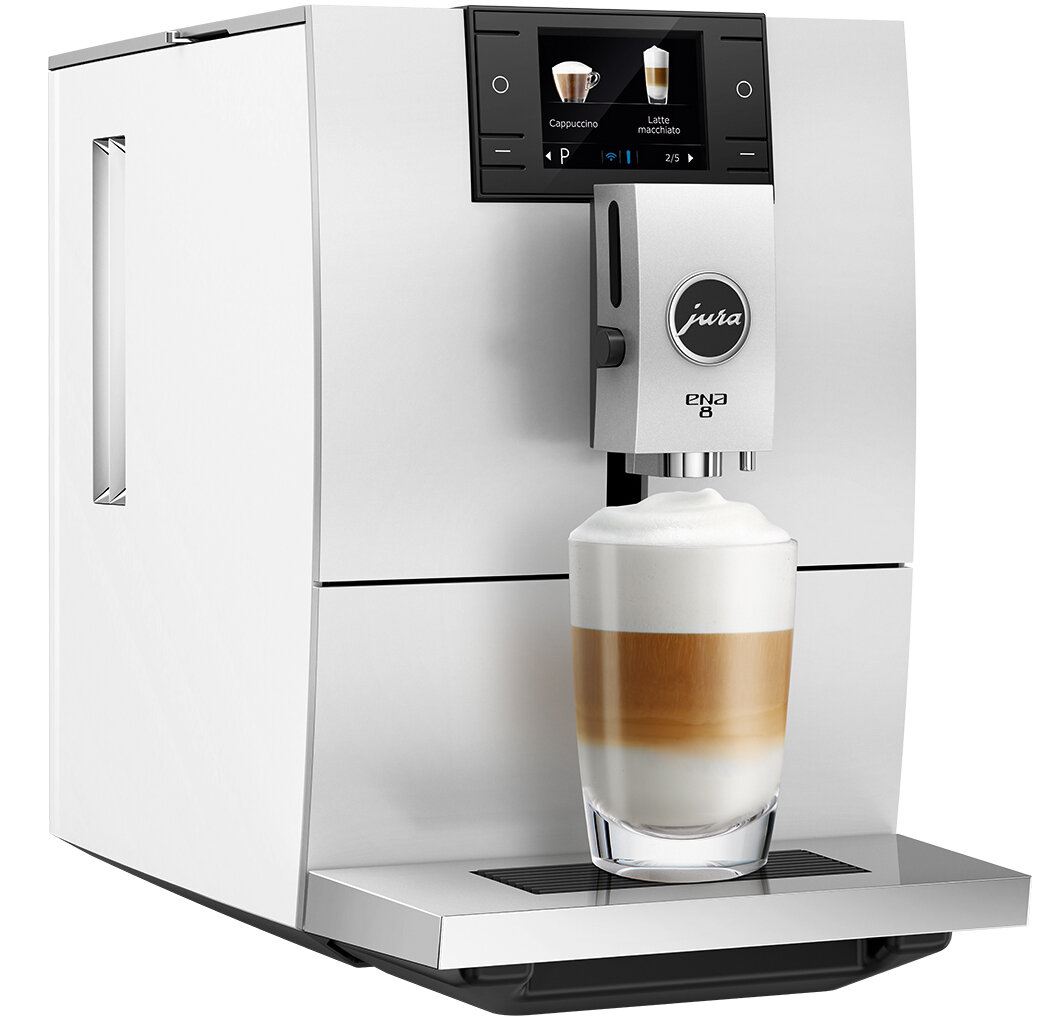 Biały ekspres do kawy Jura ENA 8 ze szklanką latte macchiato.