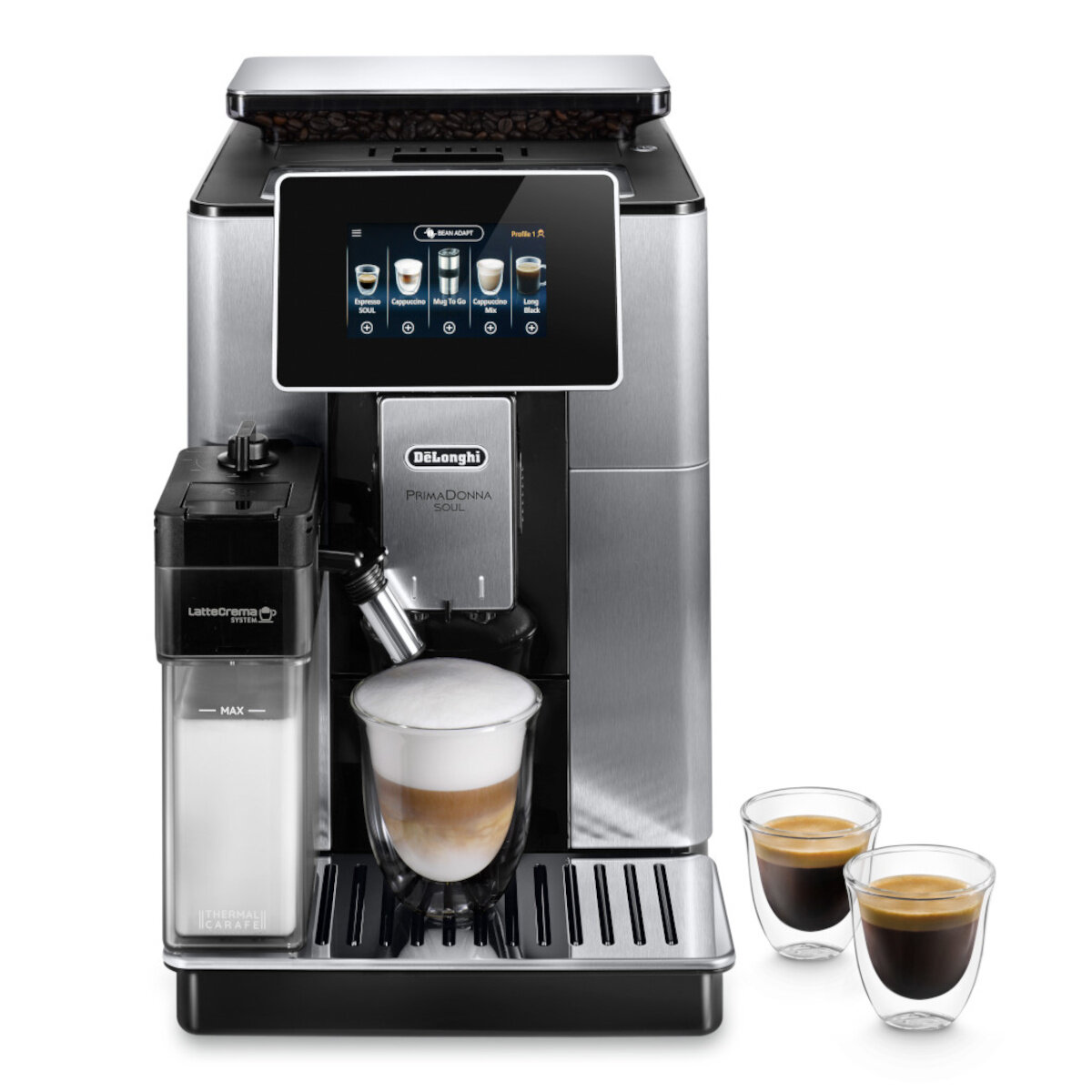 Srebrny ekspres do kawy DeLonghi PrimaDonna Soul z dwoma szklankami kawy i pojemnikiem na mleko.
