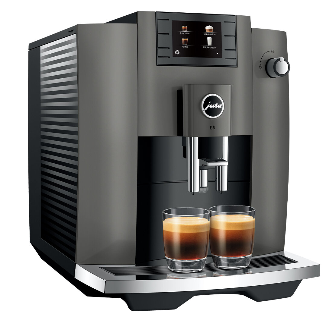 Szaro-czarny ekspres do kawy z dwiema szklankami kawy, prezentujący wyświetlacz.