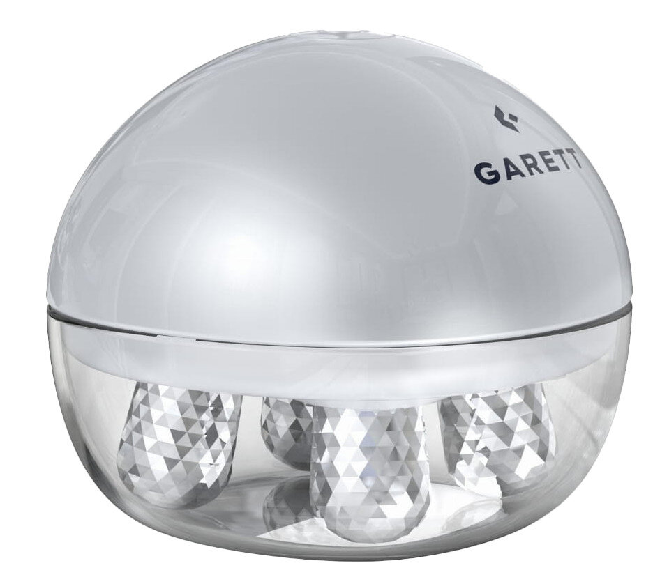 Biały i przezroczysty oczyszczacz powietrza ze srebrną górą i wstawkami w kształcie diamentów.