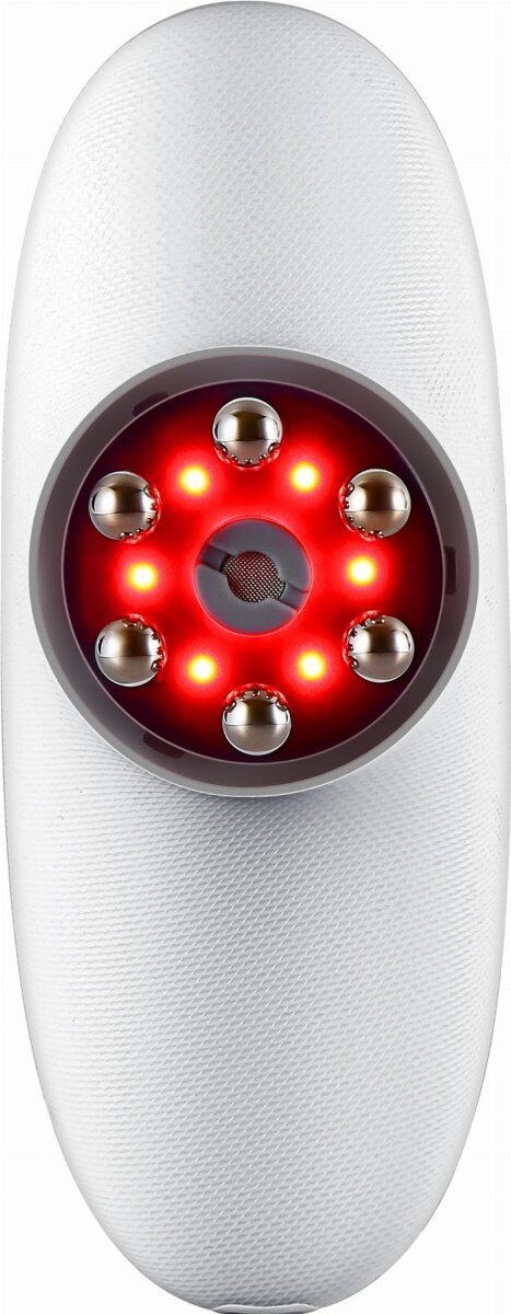 Urządzenie z czerwonym światłem i chromowanymi ćwiekami. Biała powierzchnia, widok z góry.