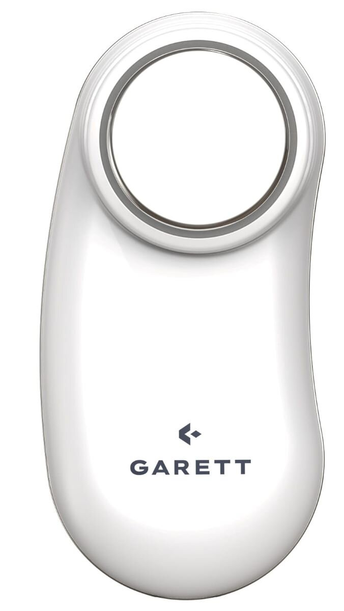 Białe urządzenie w kształcie owalu z okrągłym otworem i słowem 'GARETT' poniżej.