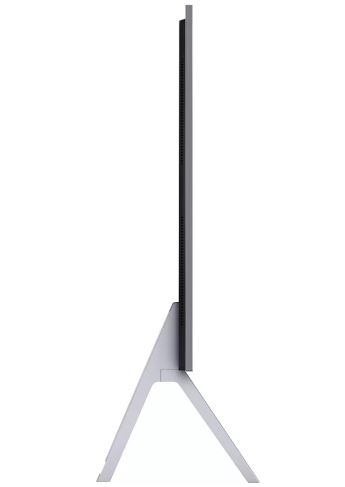Bir stand üzerinde duran modern bir TV. Yan profil görünümü.