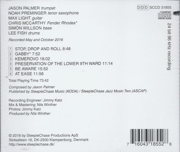 Rückseite einer CD mit Titelliste, Credits und Text auf Englisch. Die Disc ist sichtbar.