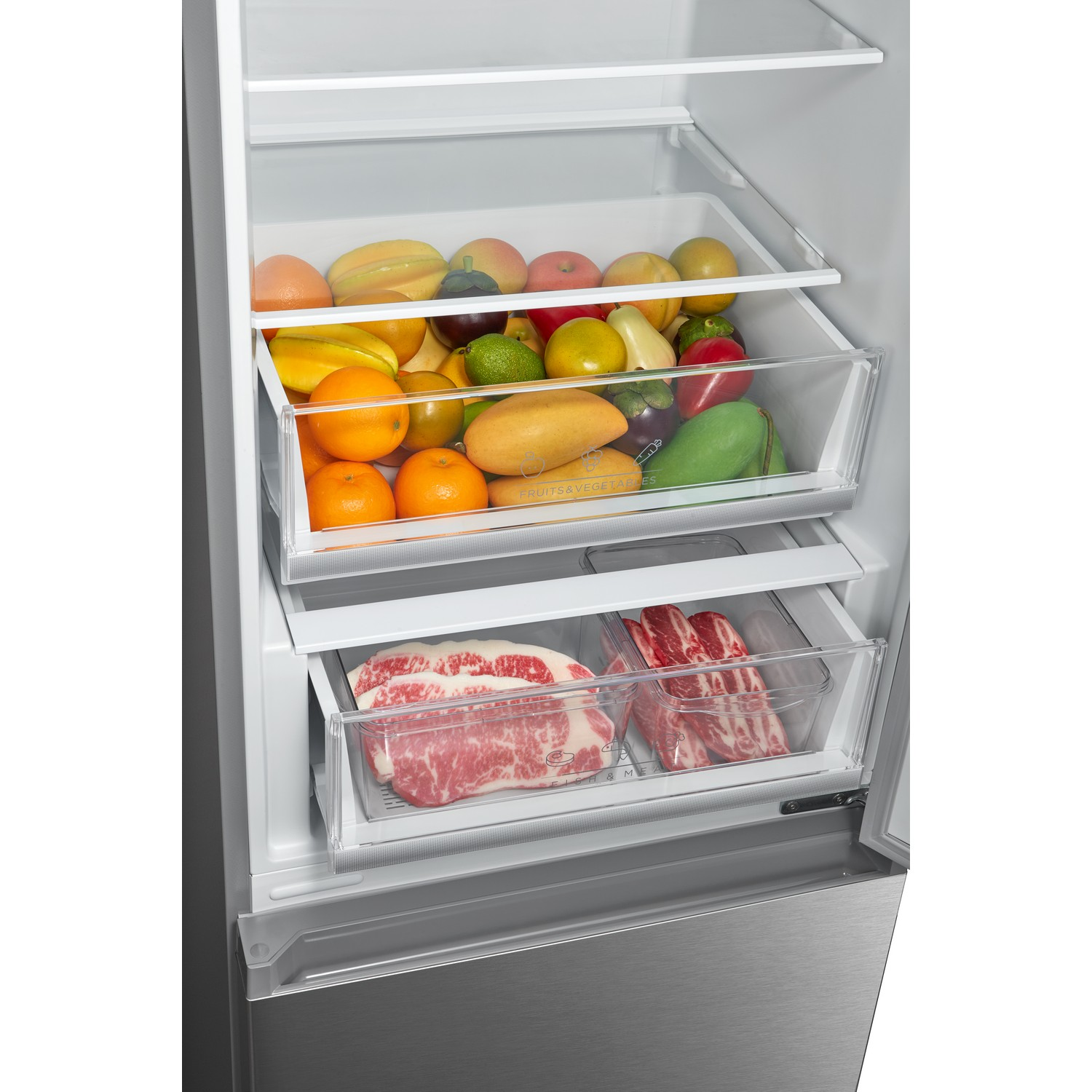 Refrigerator interior with fruits, vegetables, and meat in clear drawers.
