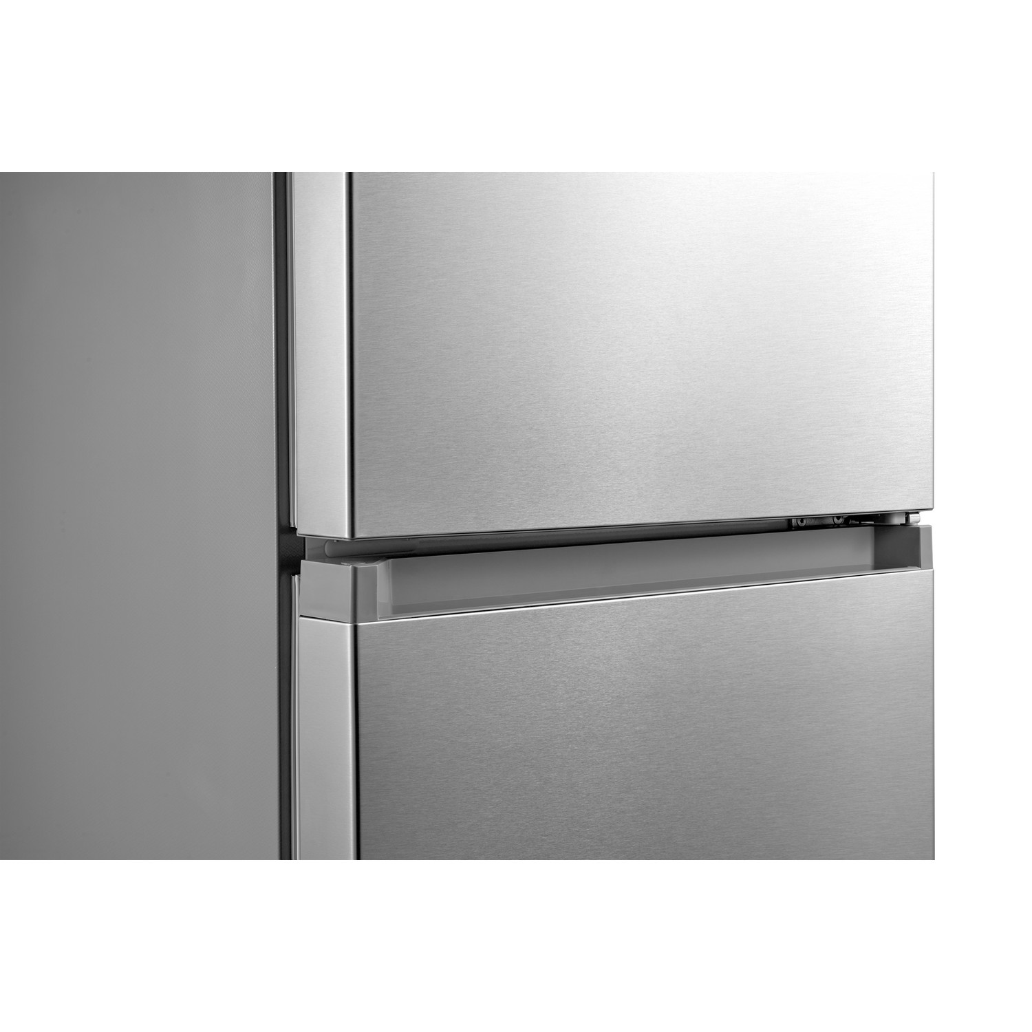 Close-up of a refrigerator door with a metallic finish.