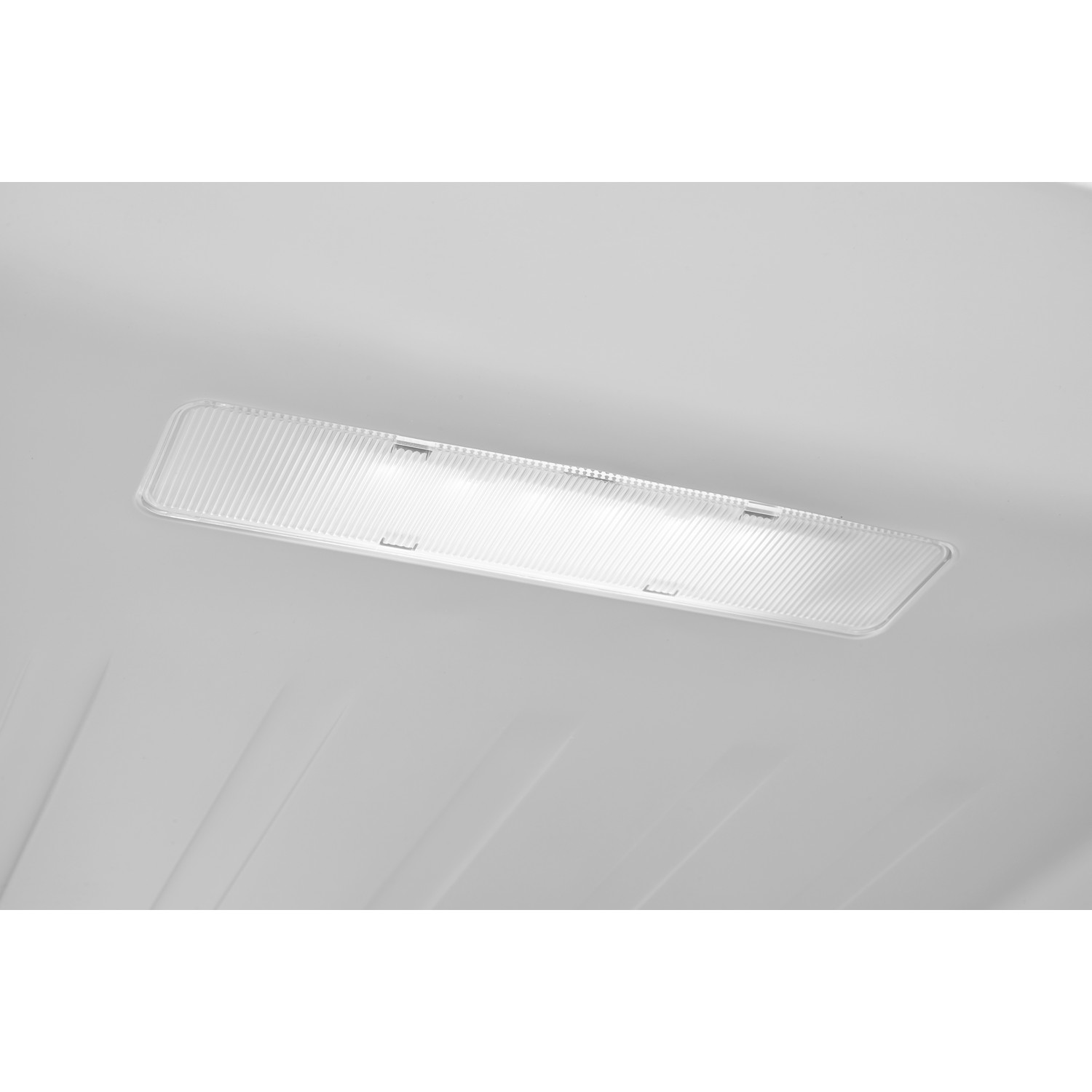 A white ceiling with a rectangular light fixture. The light is on.