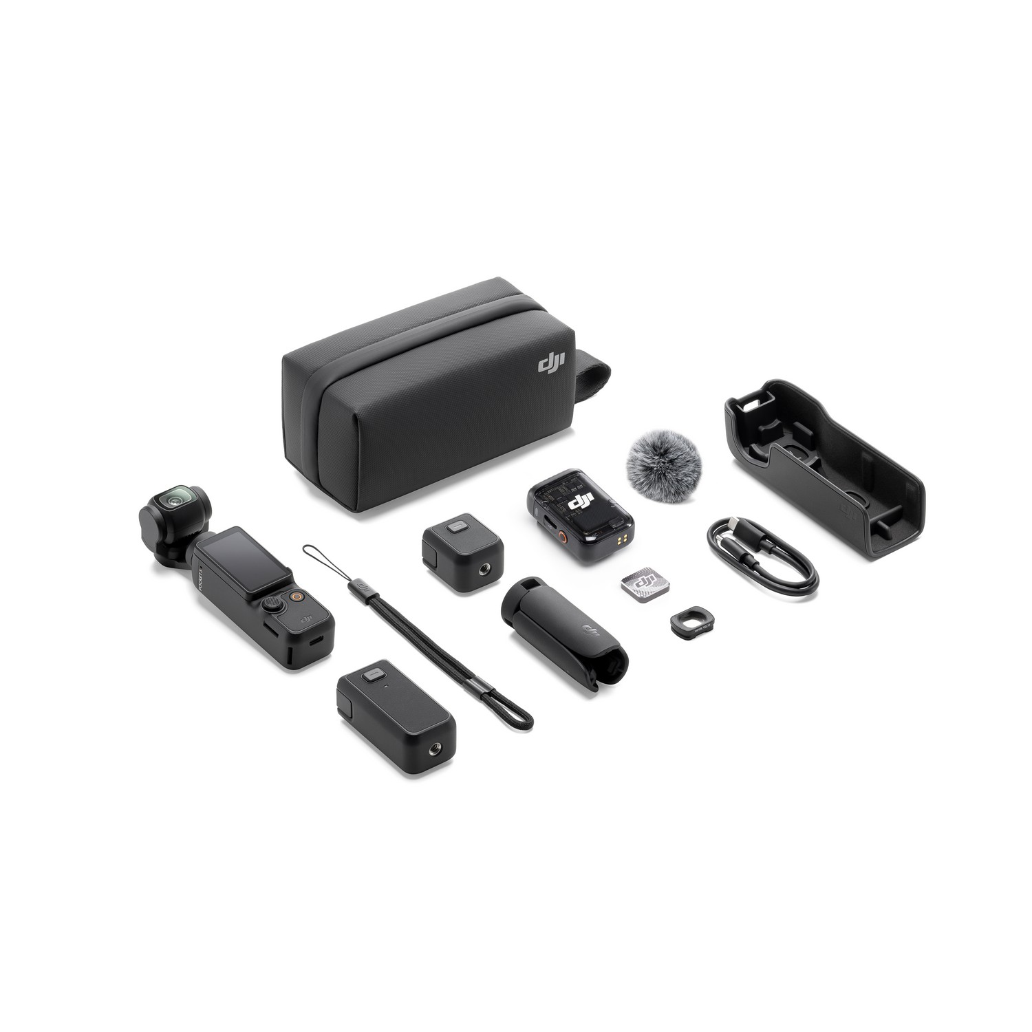 DJI Pocket 3 camera kit with accessories, including case, microphone, and cables, on a white surface.