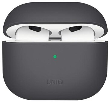 Ciemnoszara obudowa AirPod z otwartą pokrywą, odsłaniająca białe słuchawki, zielone światło.