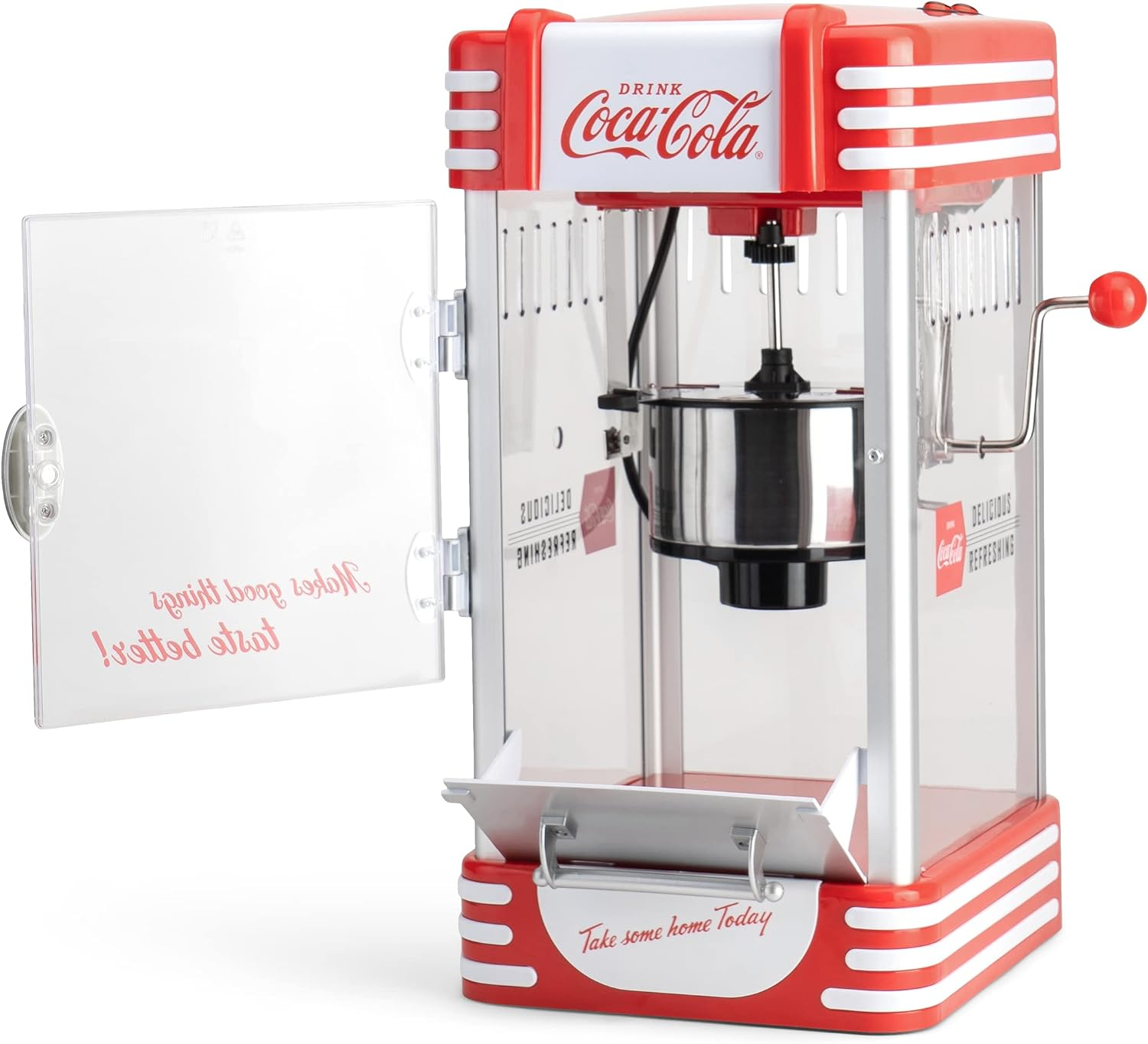Rote Coca-Cola Popcornmaschine mit offener Tür, zeigt Popcorn und Text.