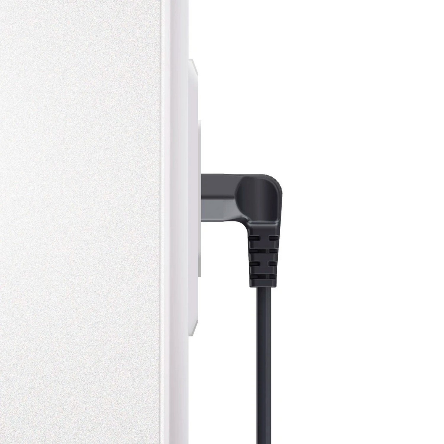 Black power plug inserted into a white wall outlet, with a black cable hanging down.