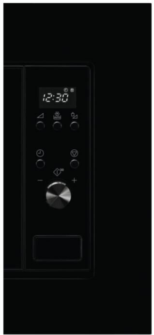 Panel sterowania kuchenki mikrofalowej z wyświetlaczem 12:30. Ma przyciski i pokrętło.