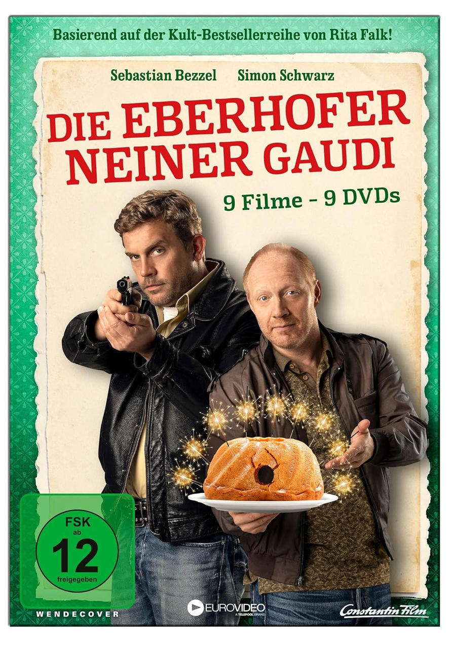 DVD-Cover mit zwei Männern, einer mit einer Waffe und einem Kuchen mit Glitzer.