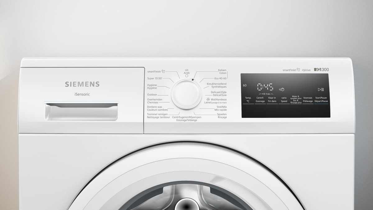 Close-up of a white Siemens washing machine control panel with a dial and display.