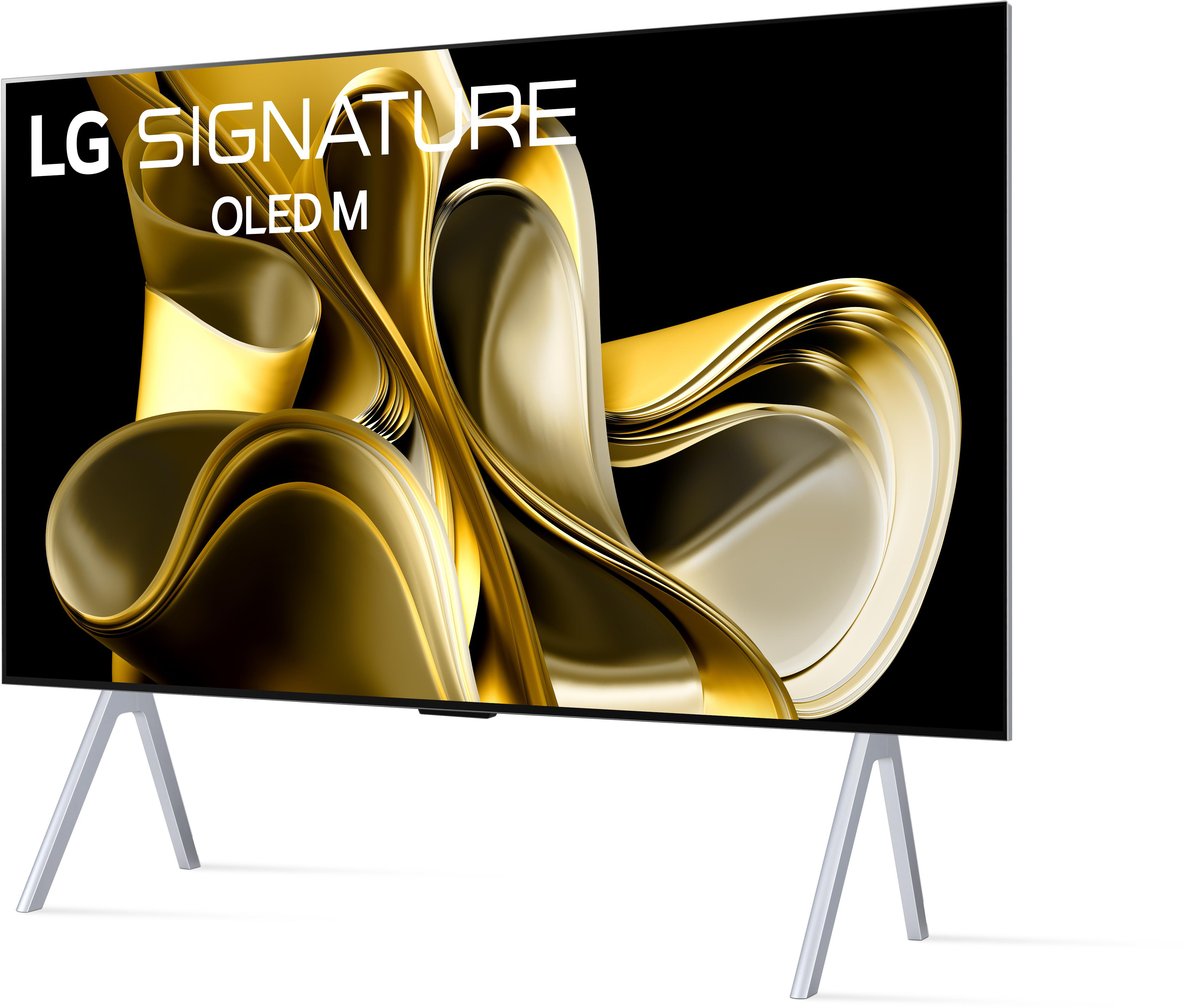Ein großer LG Signature OLED M Fernseher auf einem silbernen Ständer.