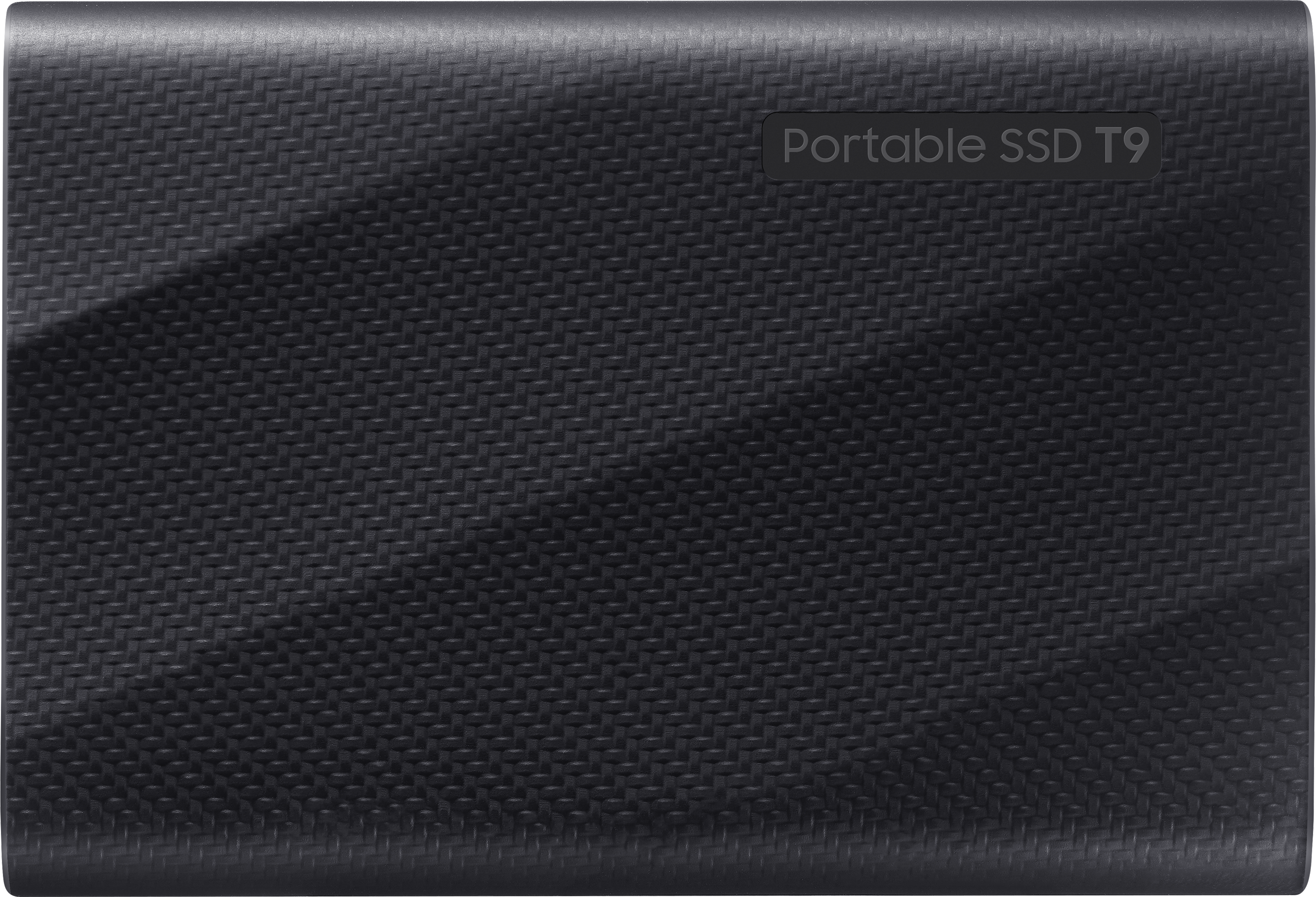 SSD portable T9 noir texturé. Le texte "Portable SSD T9" est imprimé sur le dessus.