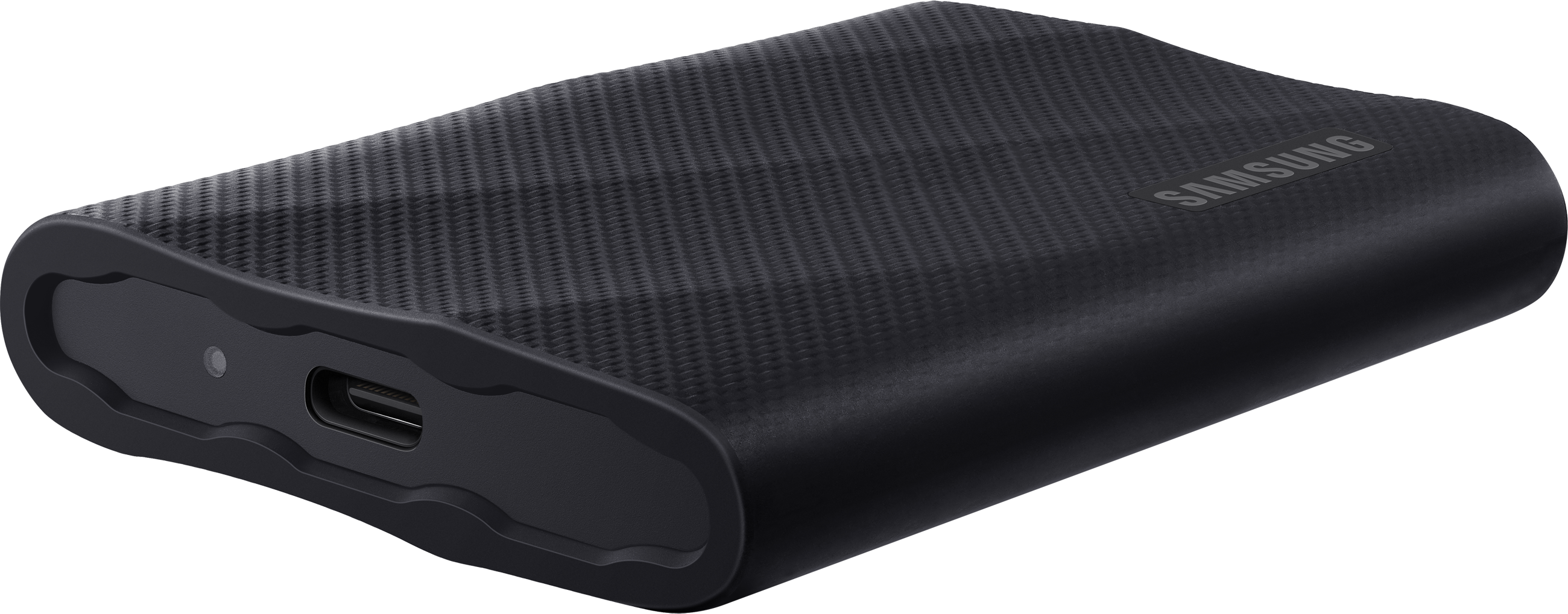 Disque dur externe portable noir. A une surface texturée et un port USB-C sur un côté.