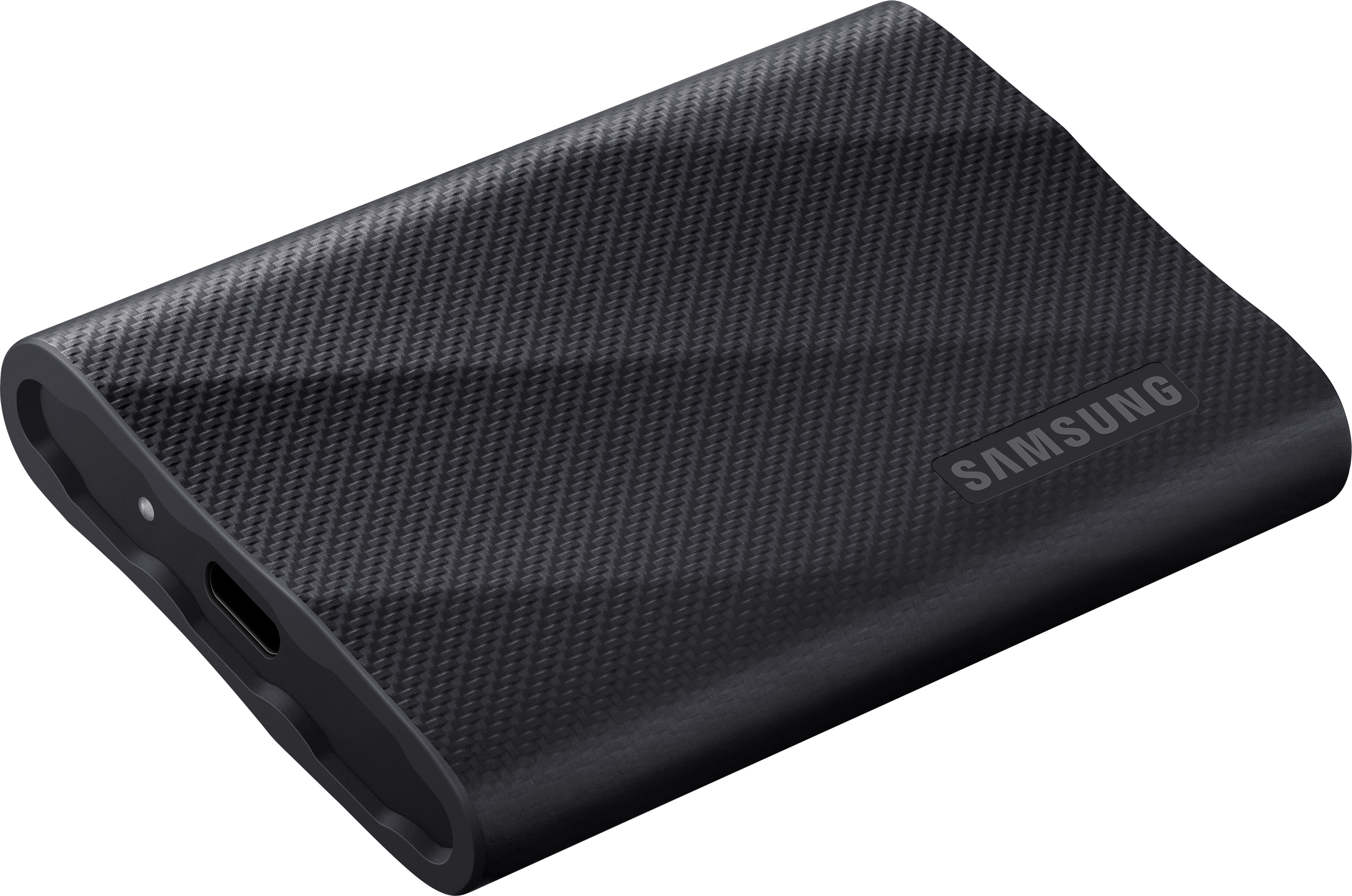 Un SSD portable Samsung noir sur une surface sombre, avec le logo Samsung visible.