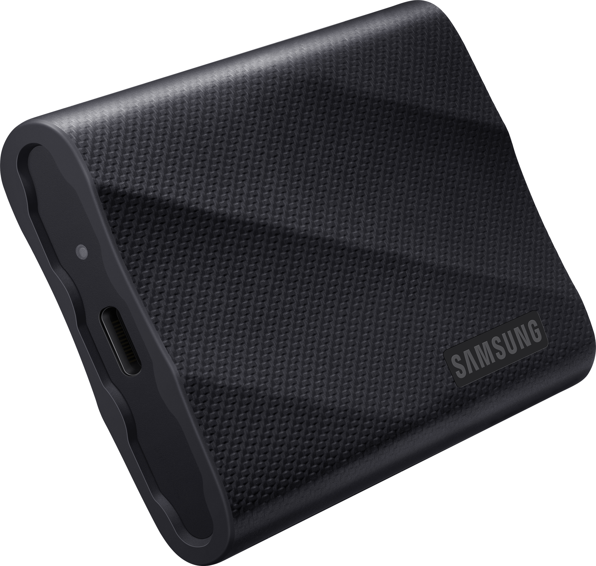 Un disque dur externe Samsung noir texturé sur fond sombre.
